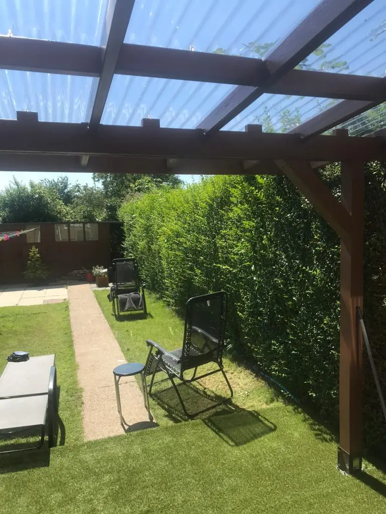 wall-mounted pergola in the back garden to create a back porch