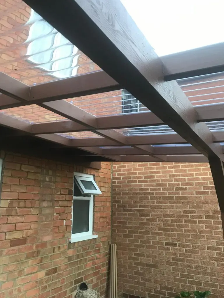 wall-mounted pergola in the back garden to create a back porch