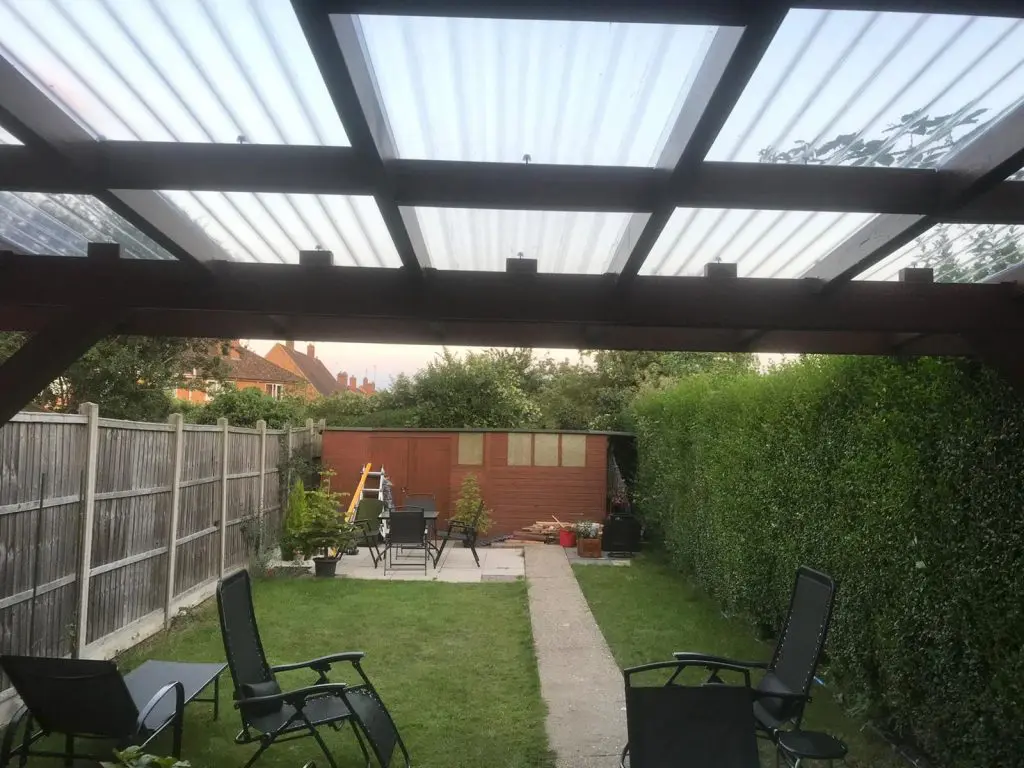 wall-mounted pergola in the back garden to create a back porch