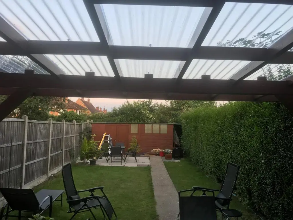 wall-mounted pergola in the back garden to create a back porch