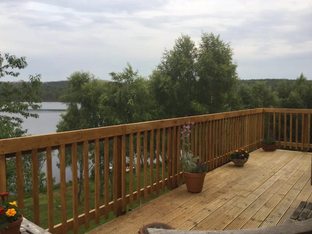 An Oak Balustrade created using Air Dried Joinery Oak Boards on a balcony.