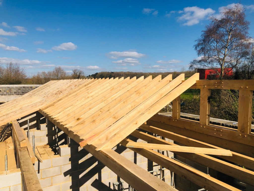 Custom cut fresh sawn oak beams used to create the roof structure