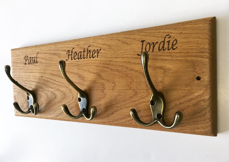 Hallway hook with children's names engraved in kiln dried oak