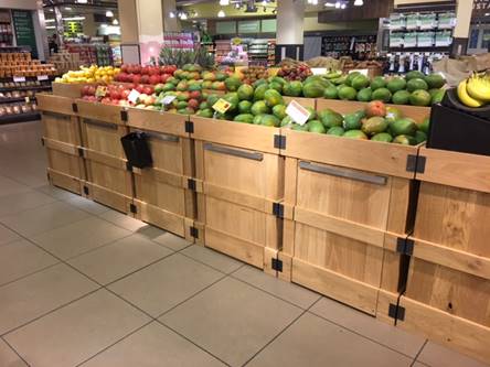 A photo of a supermarket with fruit and vegetable stalls made out of American White Oak Flooring slats