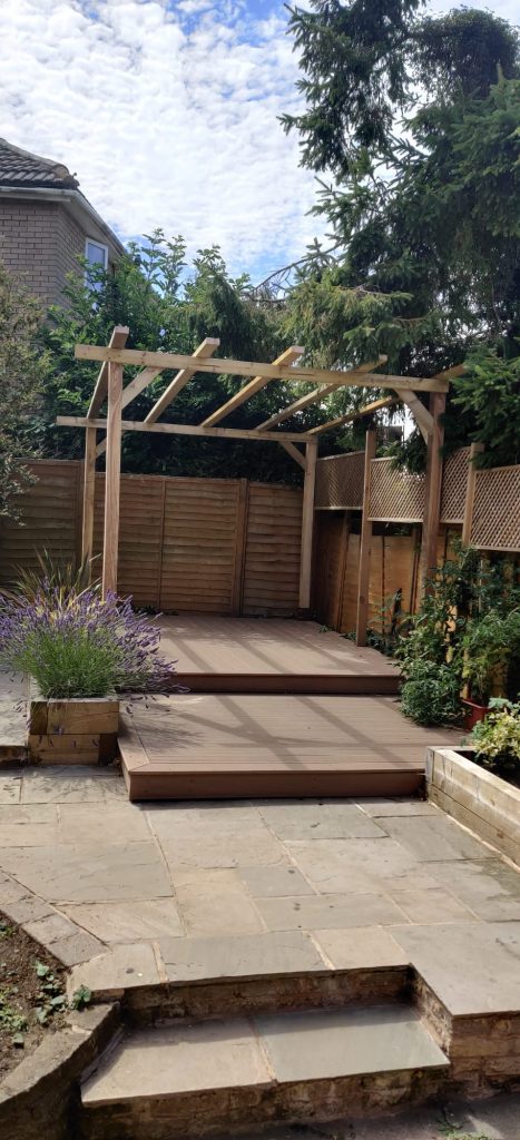 An oak pergola constructed out of custom cut fresh sawn oak and treated softwood carcassing C16 timber