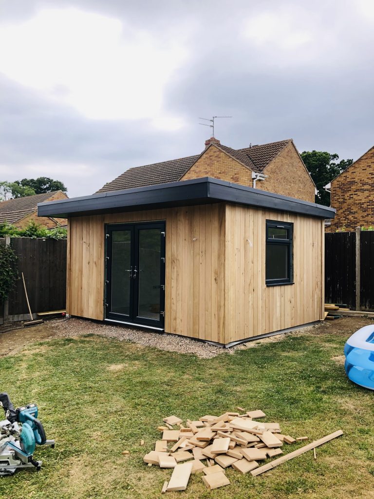 A garden room made from Character Grade External V Tongue and Groove Cladding and Fresh Sawn Oak Trim Boards